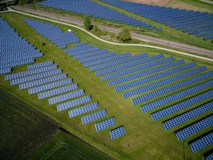 Vast solar panel field aerial view